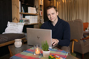 A person with a computer.